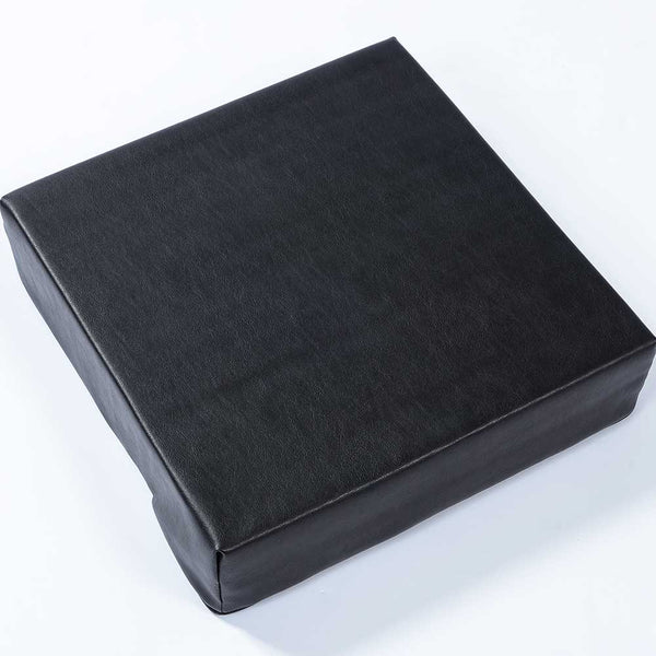 The image shows the black square raiser cushion, against a white background. 