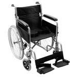 Image shows a wheelchair with silver back wheels and smaller grey and black front wheels. There is a black seat, armrests, and footprints, and a silver frame. 