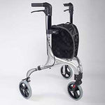Image shows three wheeled silver and black rollator with black storage bag between the handles. The small grey and black wheels, and black handles and break system are also clear, against the white background.